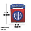 A blue embroidered patch with the word AIRBORNE and a circular emblem on a red background.