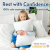 A smiling young girl is resting her head on a white pillow in a bed, with text promoting safe materials.