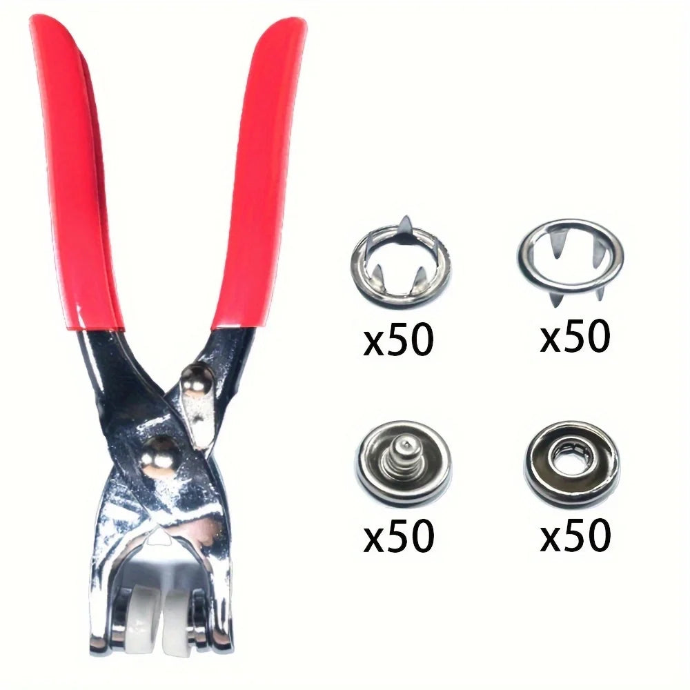 A pair of red metal sewing buttons and snap fasteners with various sizes and shapes.