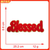 Red felt embroidery patch spelling the word Blessed