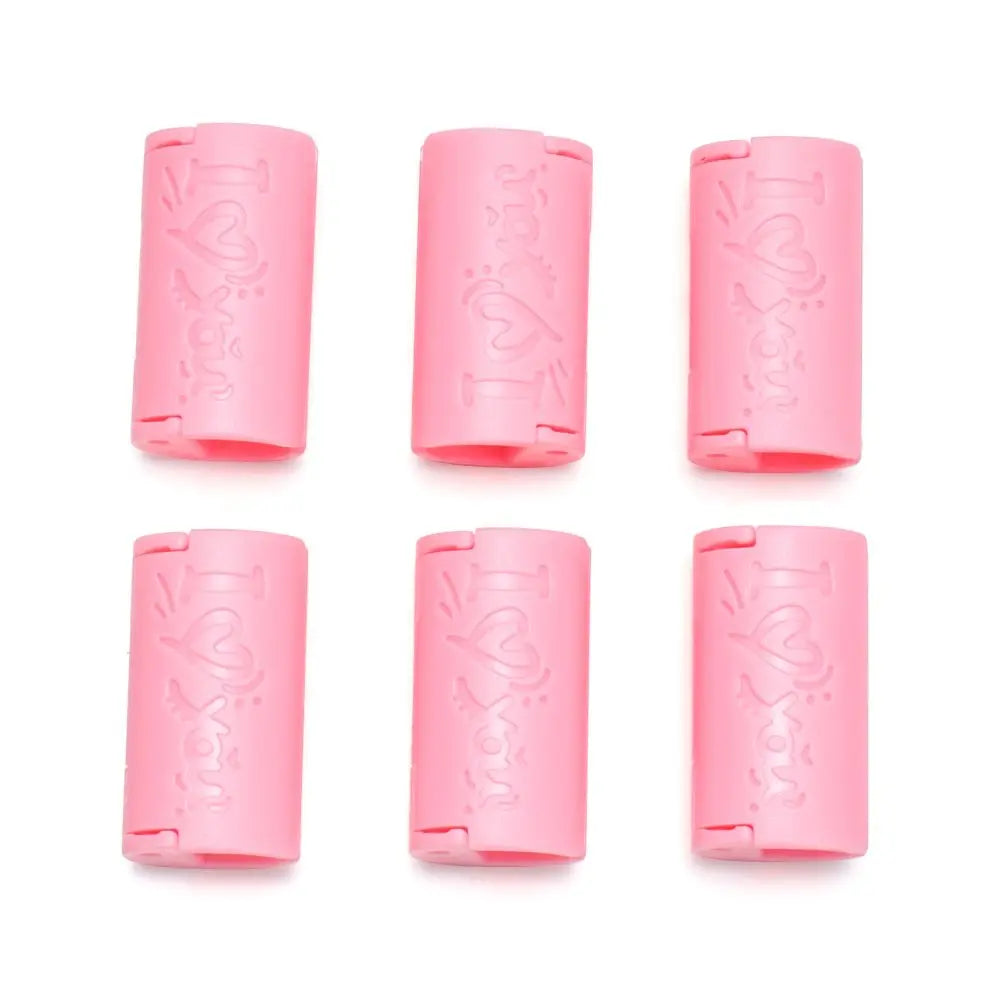 A set of six pink invisible sheet clips for securing bedding, shown in various orientations.