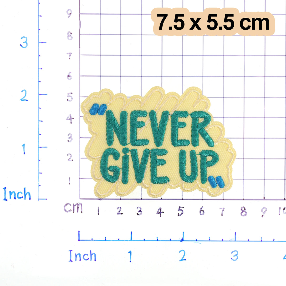 Yellow embroidered patch with the text NEVER GIVE UP in dark green lettering