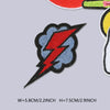 A black embroidered patch featuring a blue and red lightning bolt design.