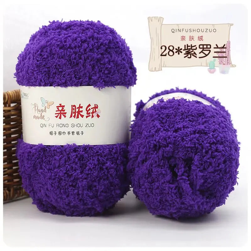 Purple soft coral velvet yarn skeins with a wooden sign indicating 28 balls for crafting