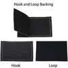 A set of black fabric patches featuring a hook and loop backing, including a hook and a loop.