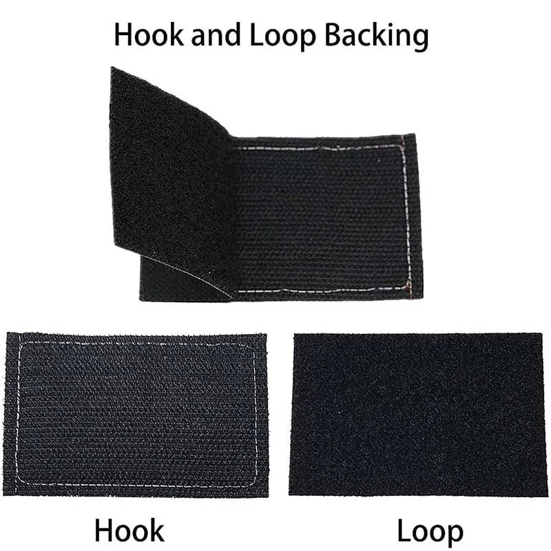 A set of black fabric patches featuring a hook and loop backing, including a hook and a loop.