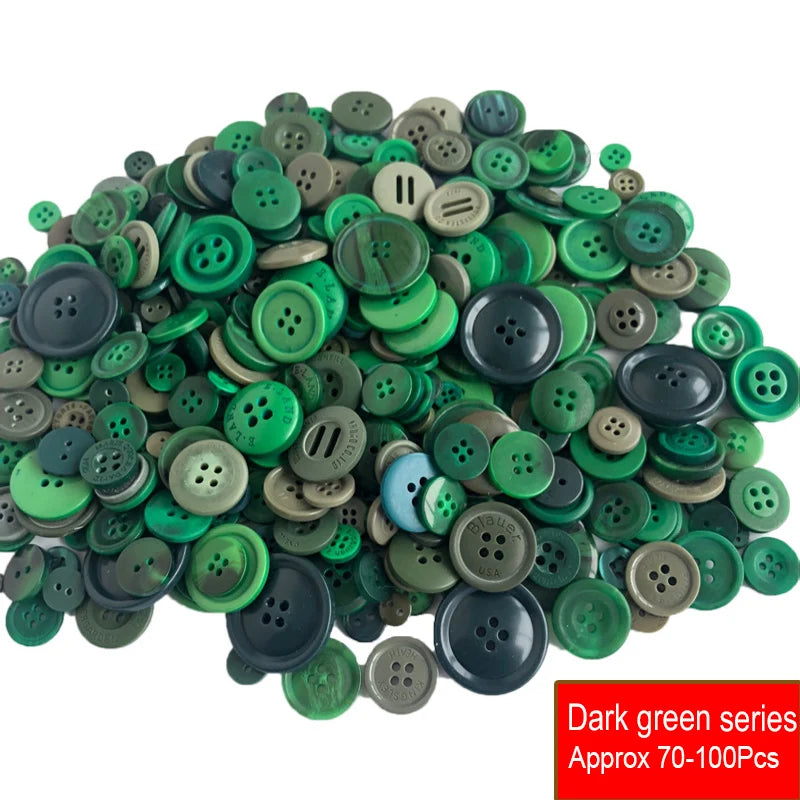 A pile of assorted dark green resin sewing buttons for crafting and DIY projects.