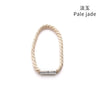 A delicate pale jade braided bracelet with silver magnetic clasp.