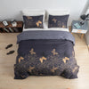 A dark blue duvet cover set featuring a gold butterfly print with matching pillowcases and a white accent pillow.