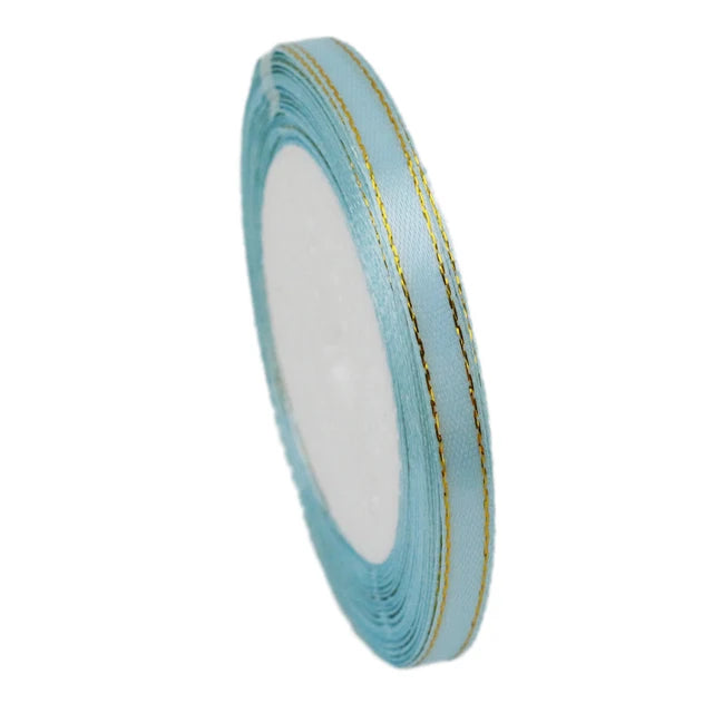 Roll of 6mm gold-edged satin ribbon in light blue for gift wrapping and crafts