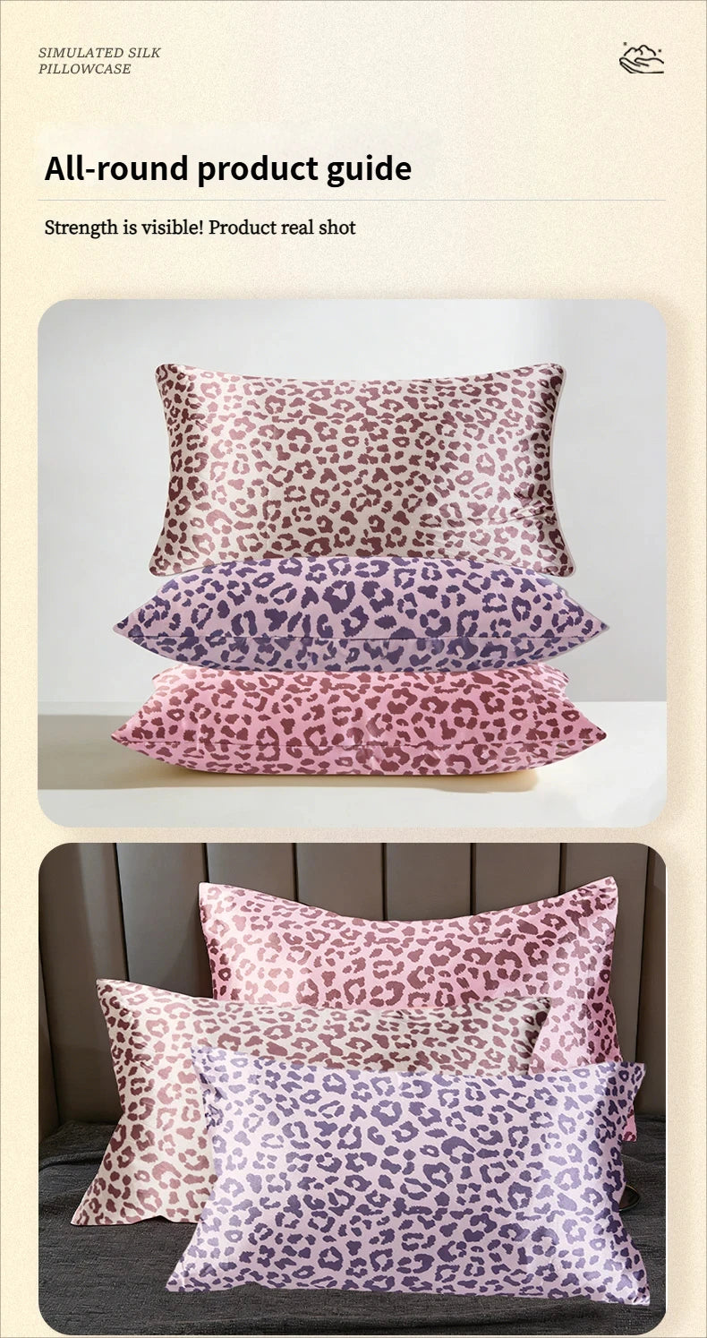 A stack of five leopard print satin pillowcases in various shades of pink and purple.