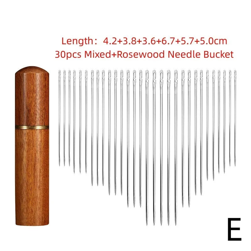 A wooden bucket containing 30 pieces of mixed and rosewood sewing needles.