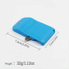 A light blue magnetic sewing guide and seam ripper tool with measurement markings.