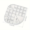 A clear acrylic quilting ruler with corner templates for sewing and patchwork, showing various measurements.