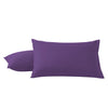 A pair of solid purple microfiber pillow covers.