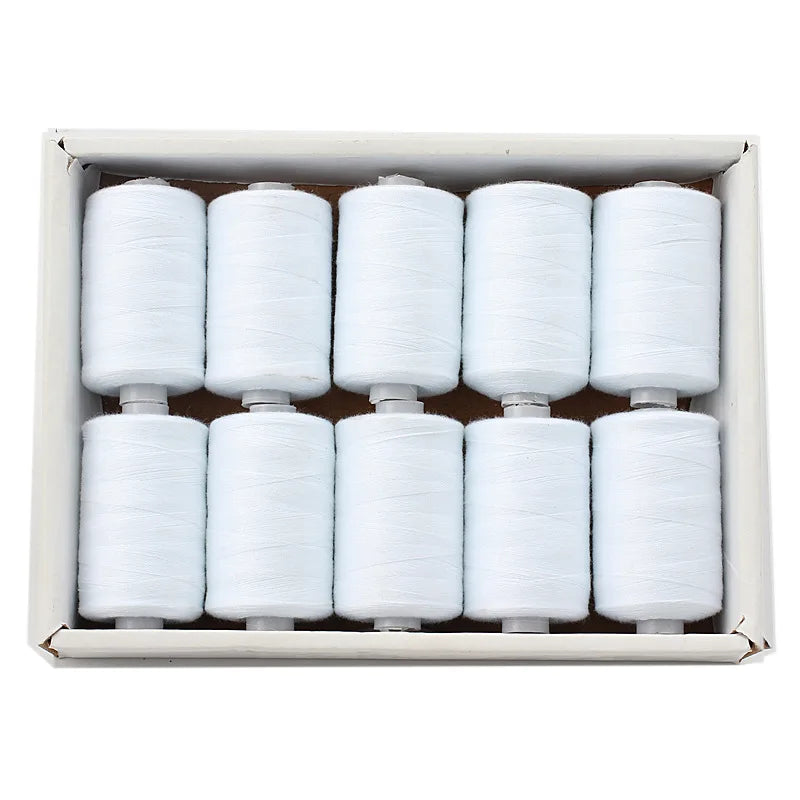 A box containing twelve white polyester sewing thread spools arranged in a grid.