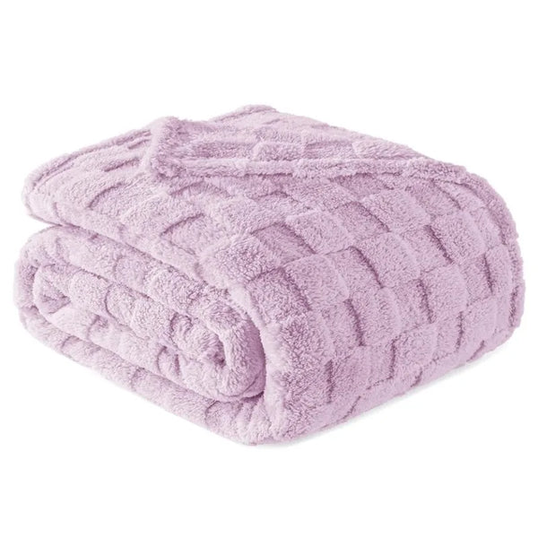 A soft lavender checkered fleece throw blanket rolled up.