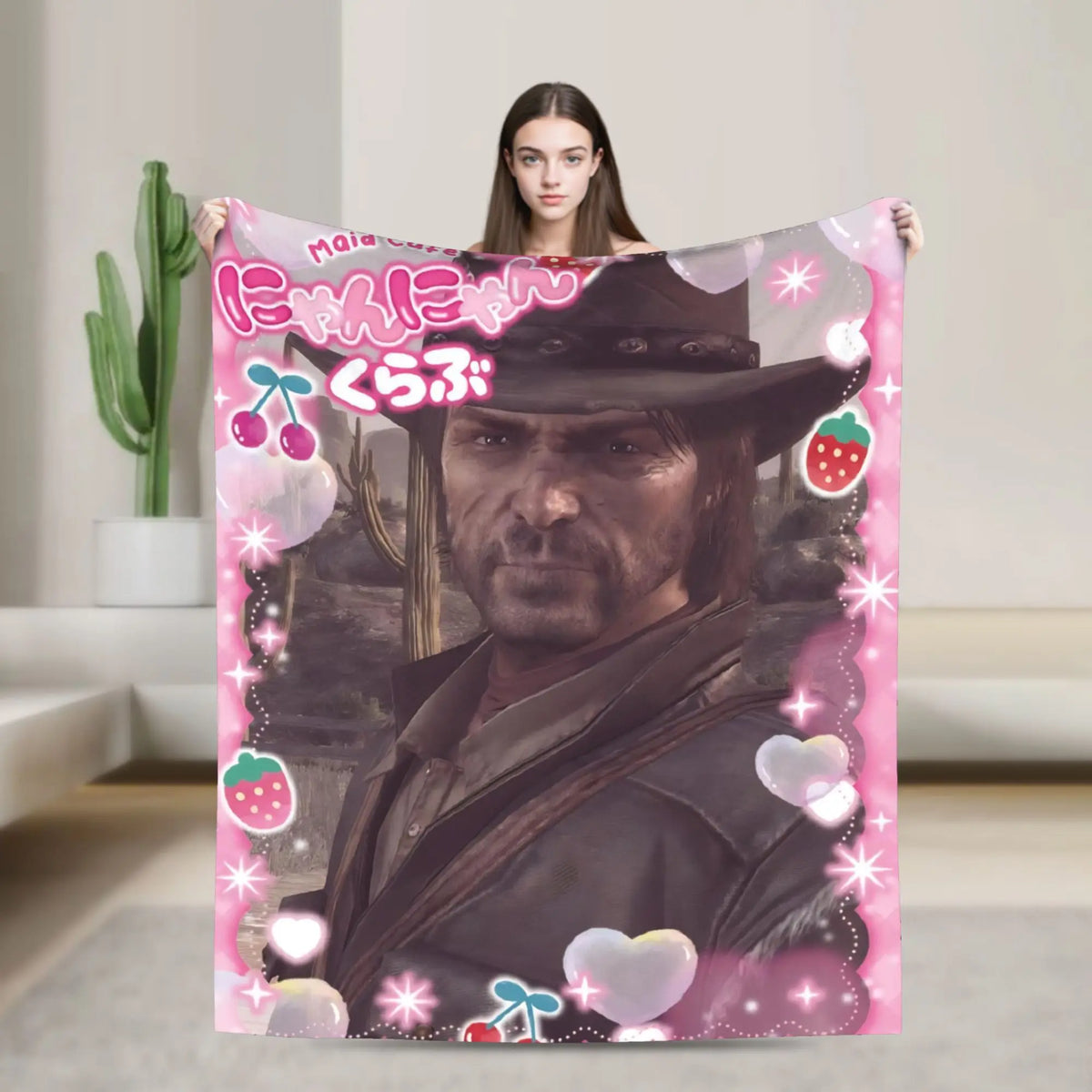 A pink and purple blanket featuring a portrait of a man in a hat with Japanese text.