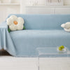 Light blue waterproof chenille sofa cover featuring white floral accents and anti-slip protection.