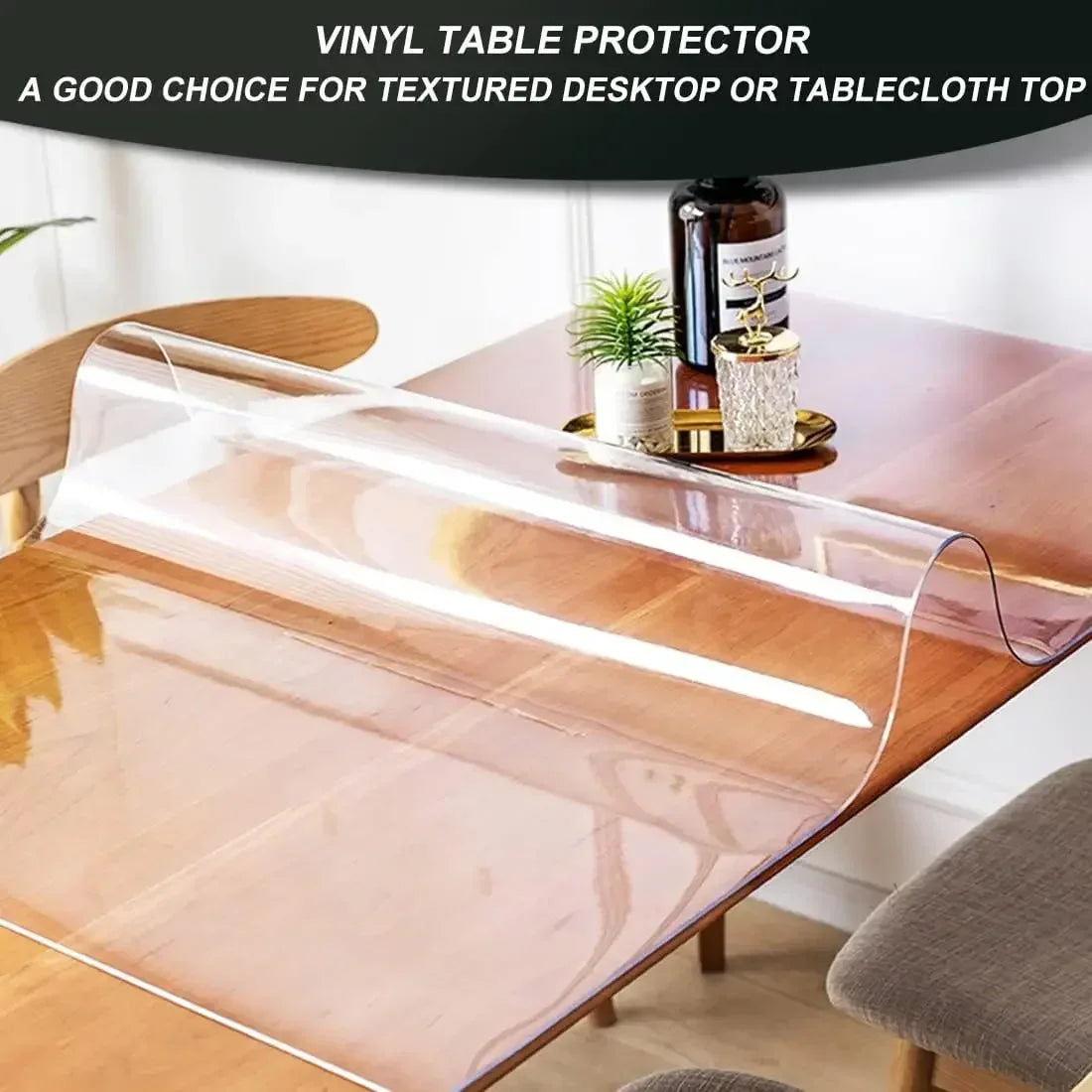 A clear PVC vinyl table protector mat placed on a wooden tabletop.