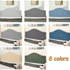 A collection of eight soft elastic headboard covers in various shades of gray and blue.