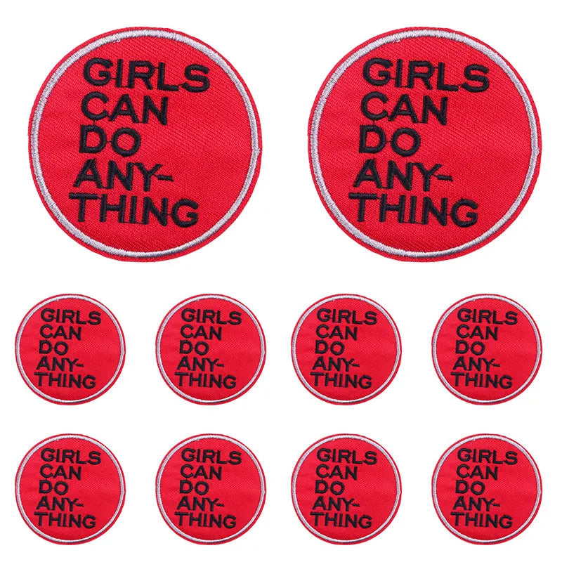 Set of nine red embroidered patches with the slogan Girls Can Do Anything