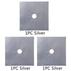 Two square pieces of silver material, each with a circular hole, shown side by side.