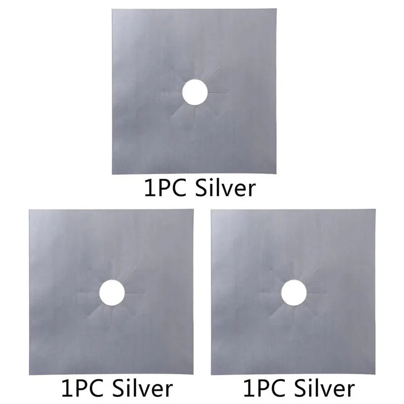 Two square pieces of silver material, each with a circular hole, shown side by side.