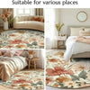 A round ethnic geometric non-slip area rug featuring floral patterns in shades of pink, green, and beige.