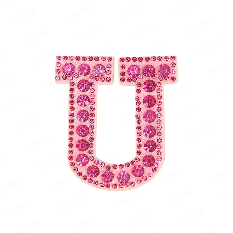 Pink rhinestone letter U patch for DIY craft project