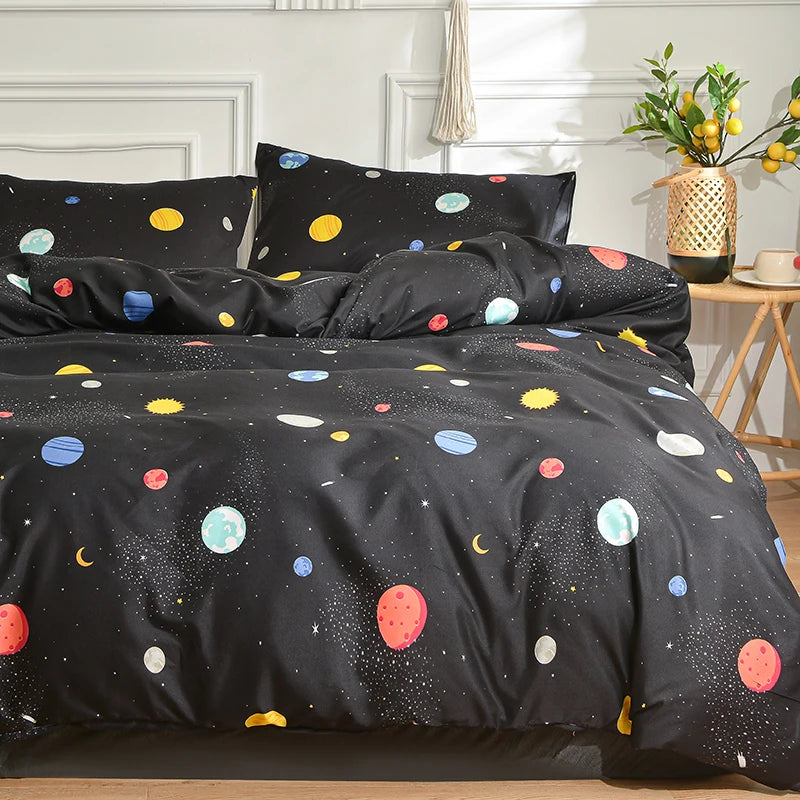 Black duvet cover set with a marble print featuring colorful dots and stars