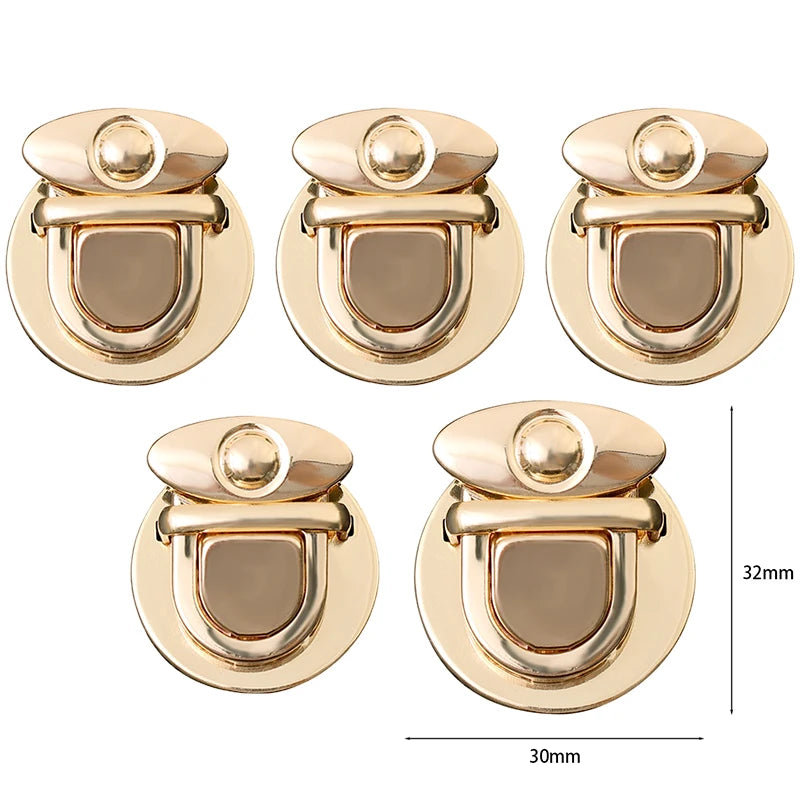 A set of five gold-toned metal bag lock clasps for handbags and totes shown in various angles.