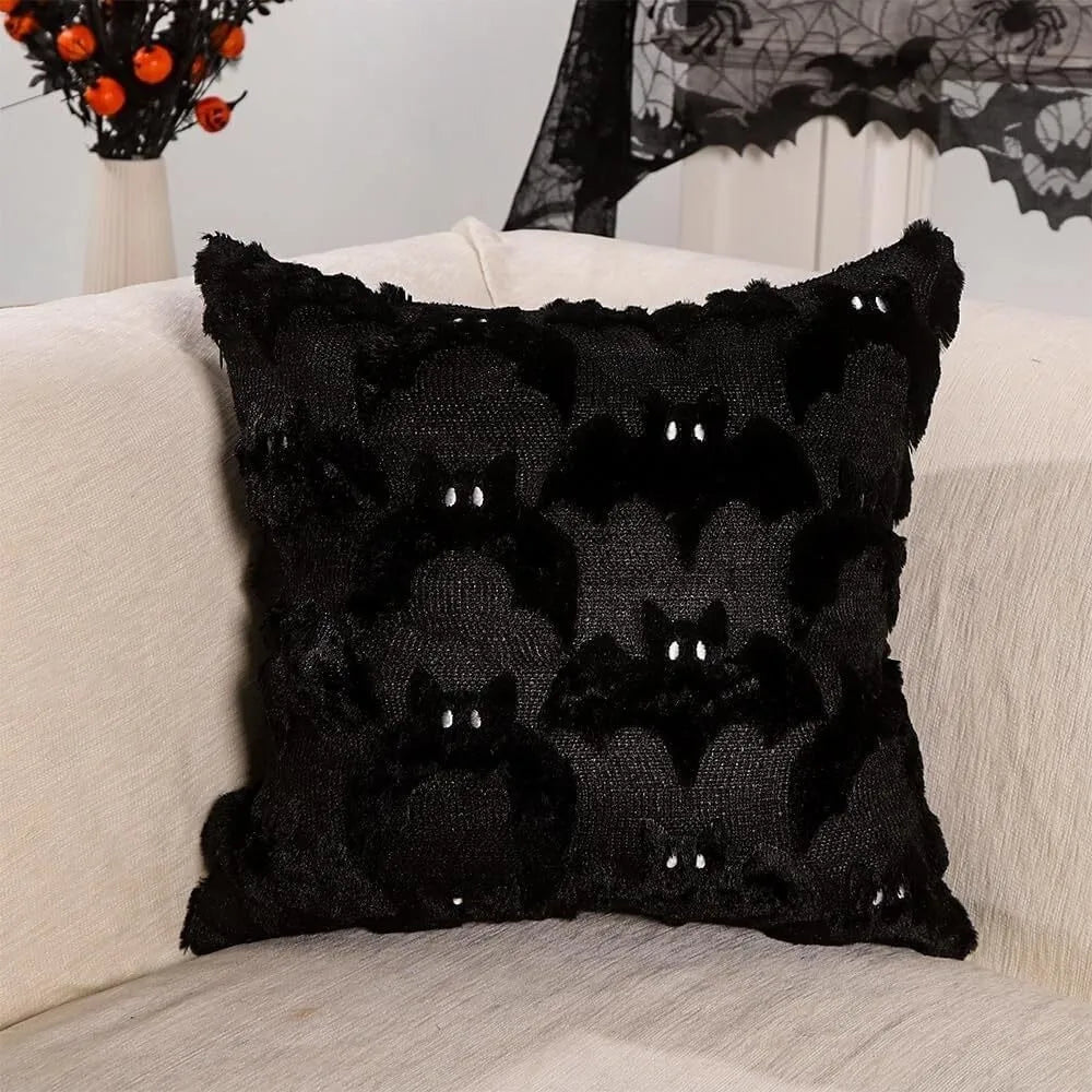 Black lace throw pillow cover featuring a bat and ghost pattern