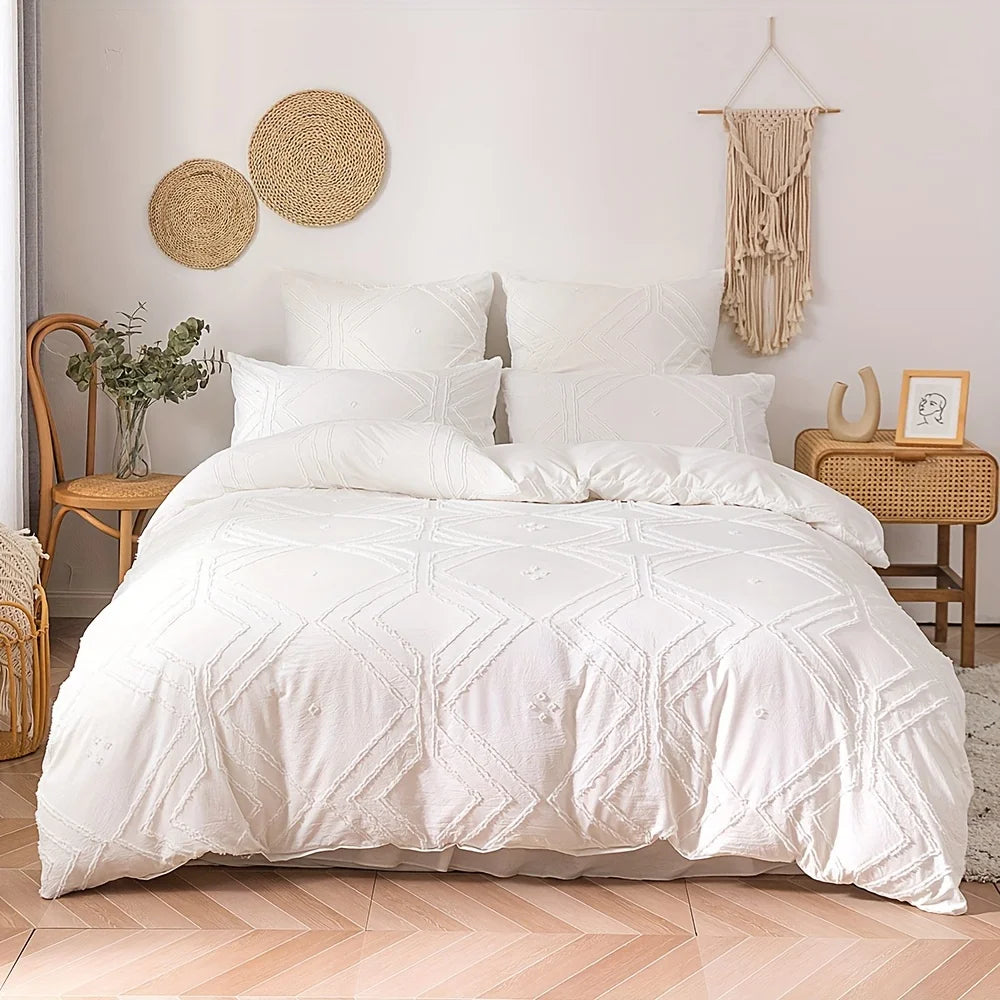 A white bohemian grid tufted duvet cover set displayed on a bed with natural fiber accents.