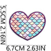 A heart-shaped embroidery patch featuring a scale pattern in pastel pink, peach, and blue hues.