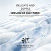 Close-up of a silky fabric sheet with snowflake patterns, emphasizing cooling and comfort.