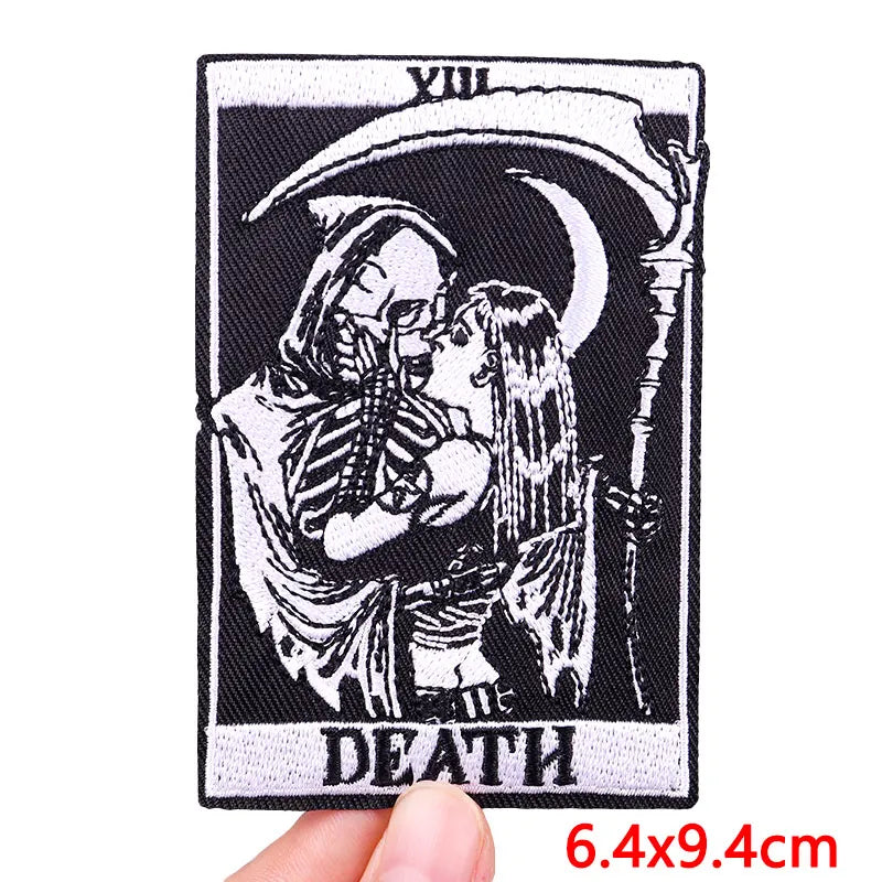 Black embroidery patch featuring a skull and crossbones design with the word DEATH on it
