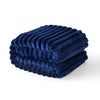 A stack of dark blue striped flannel throw blankets folded neatly.