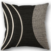 A black and white abstract geometric throw pillow cover with curved stripes.
