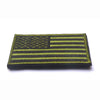 A rectangular patch featuring the design of the American flag with horizontal stripes and a canton, backed with hook and loop