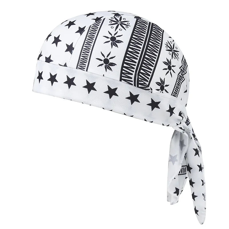 White and black paisley print unisex headwrap with star and geometric patterns