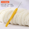 A yellow C-2.5mm crochet hook is shown next to a ball of white yarn.