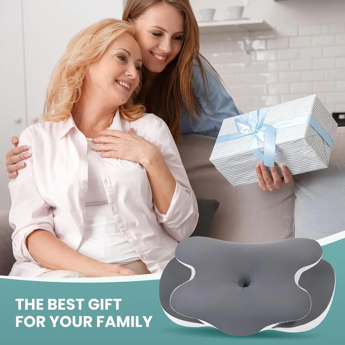 A woman is hugging another woman while holding an ergonomic memory foam neck pillow.