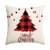 A festive red and black plaid Christmas tree design on a cream pillow with hanging ornaments.