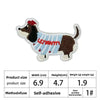 An embroidered patch of a dog in brown and white with red accents.