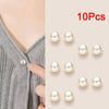 Ten pearl button pins are displayed against a light background.