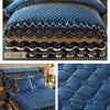 Navy blue velvet bed skirt with gold embroidery and diamond pattern