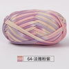 A ball of hand-dyed fabric strip yarn in shades of pink and lavender for crochet and knitting.