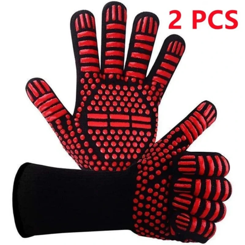 Pair of black and red heat resistant BBQ gloves with silicone grip