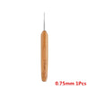 A single wooden precision crochet hook with a fine metal tip, measuring 0.75mm.